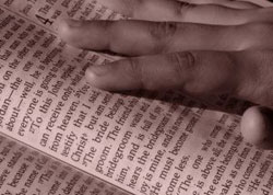 touch hand on book