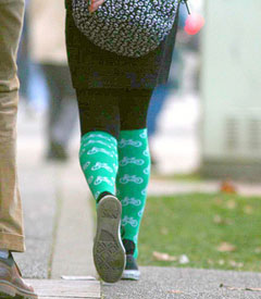 girl walking with bike socks